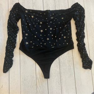 LOVERS + FRIENDS OFF THE SHOULDER BLACK GOLD STAR THONG
BODYSUIT W SHEER SLEEVES